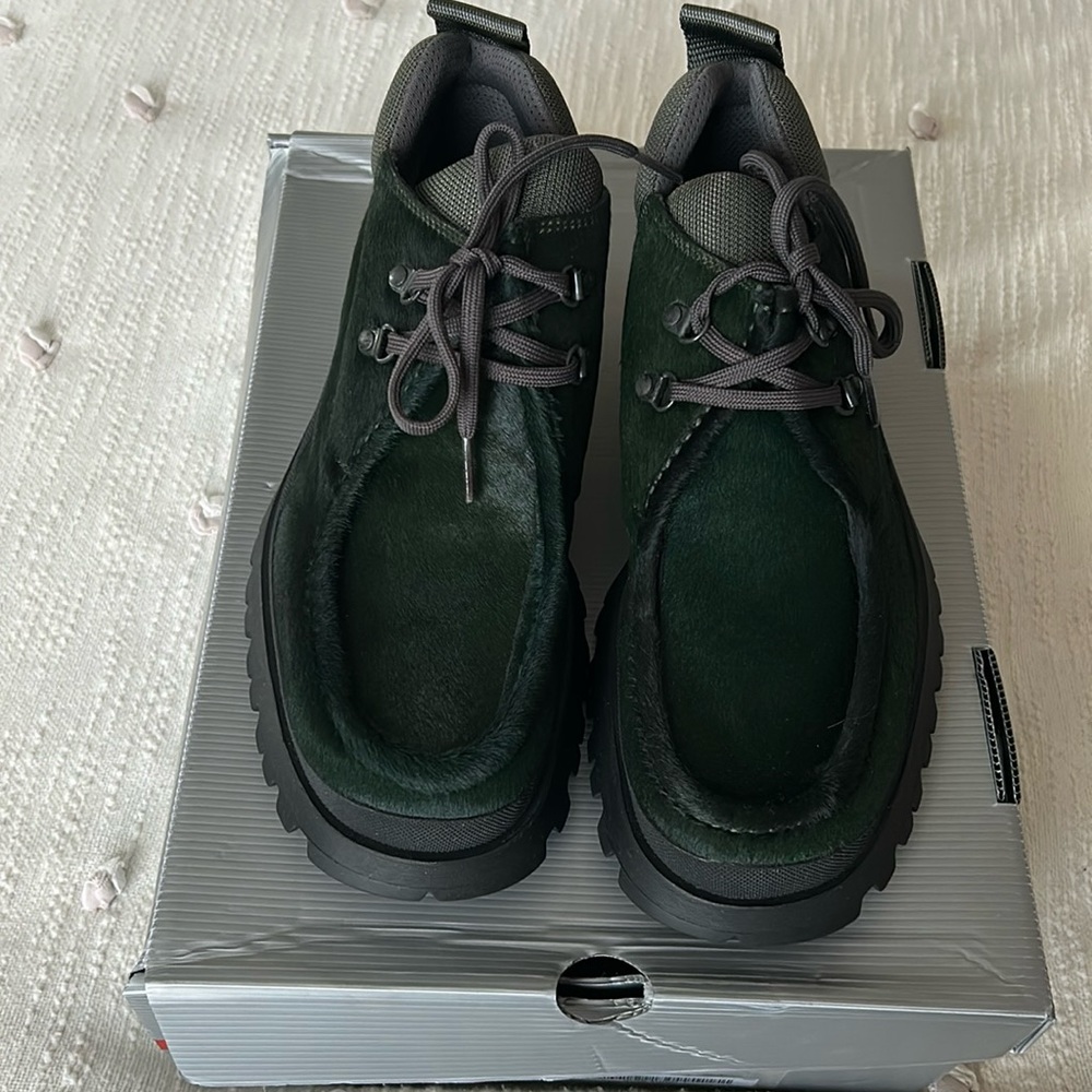 Prada Cavallino+Odiss laced up.